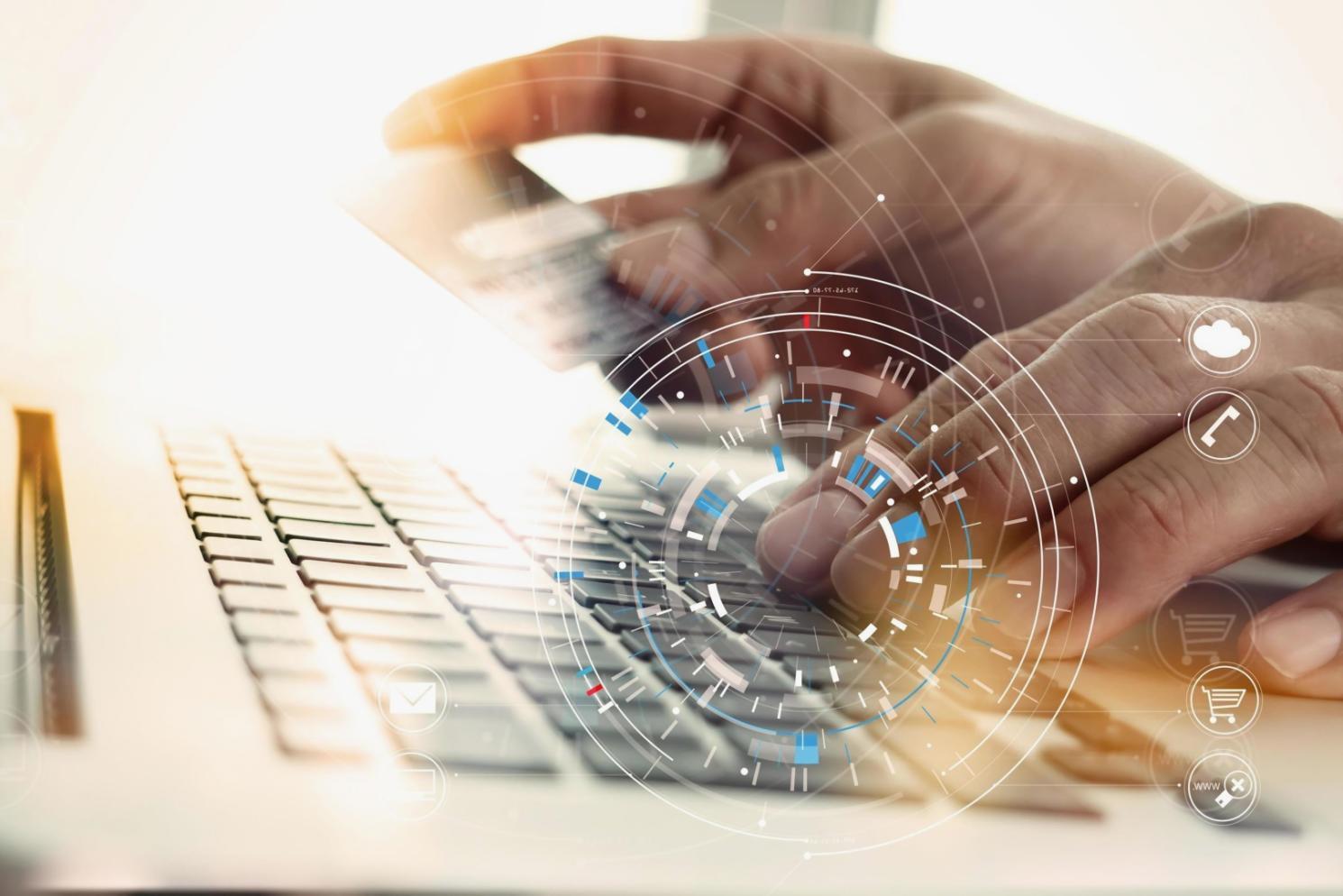 Student working on responsive web design project with multiple device views