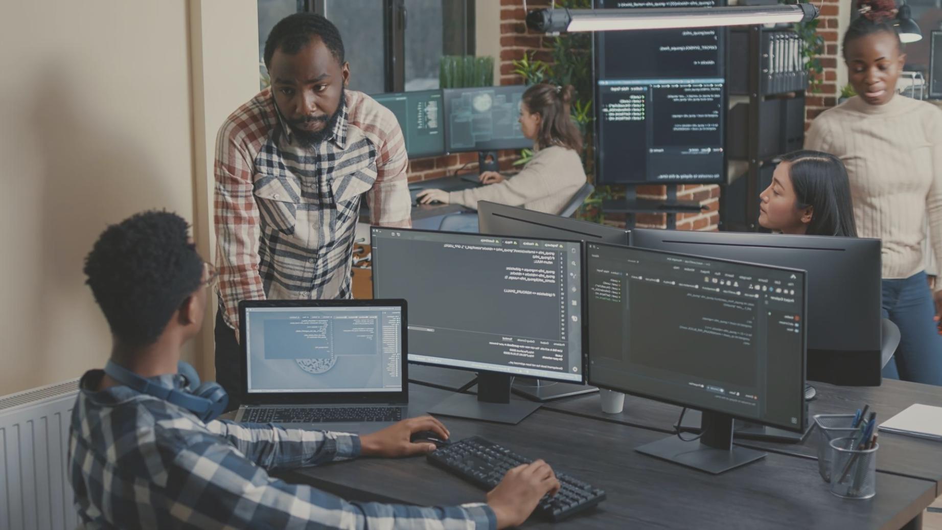 Students engaged in collaborative web design learning session